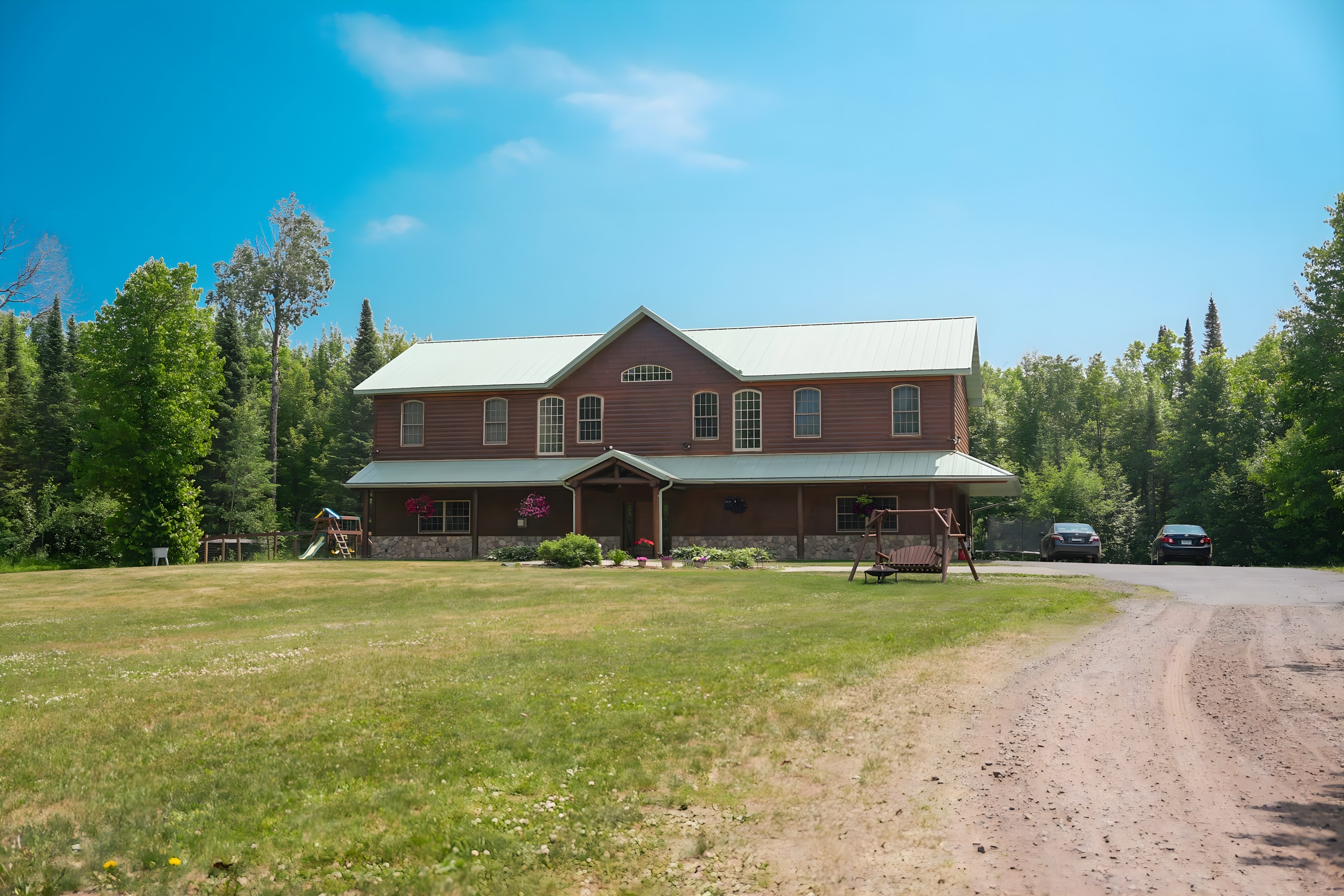 Twin Ports Hideaway lodge surrounded by pines