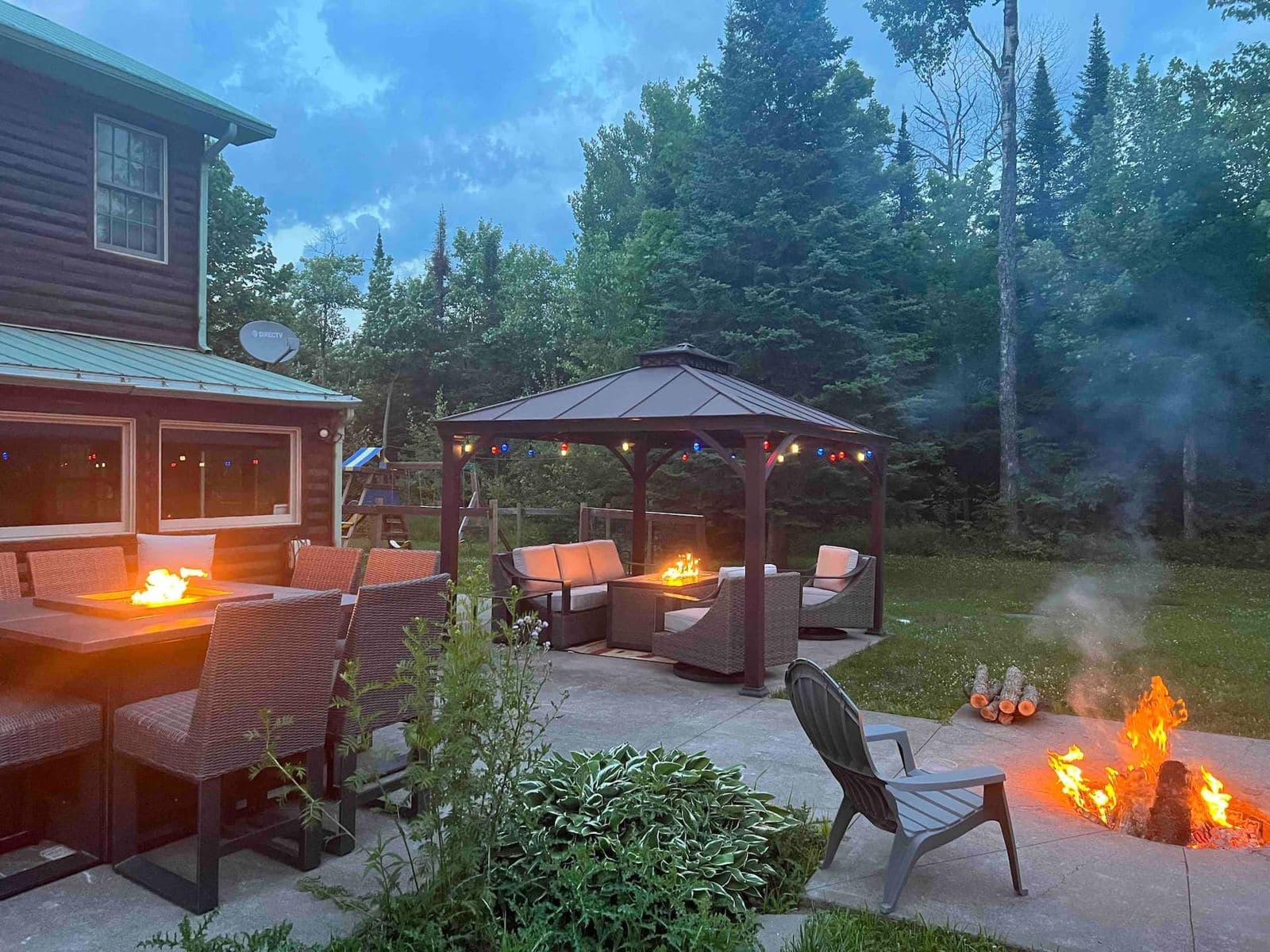 Patio with fire tables at dusk
